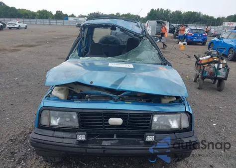1994 Geo Tracker from USA, damaged, VIN 2CNBJ18U5R6945044